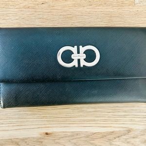 Authentic Ferragamo black leather wallet. Good condition.